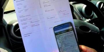Documento de licenciamento de veículo.